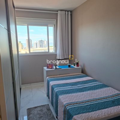 Apartamento com 62m², 2 quartos (sendo 1 suíte), 1 garagem, no bairro Roçado em São José
