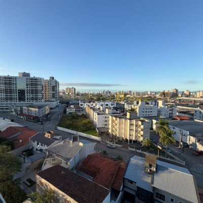 Apartamento com 66m², 2 quartos (sendo 1 suíte), 1 garagem, no bairro Roçado em São José