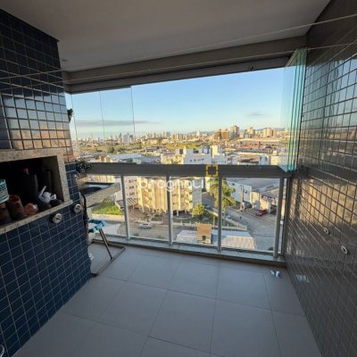 Apartamento com 66m², 2 quartos (sendo 1 suíte), 1 garagem, no bairro Roçado em São José