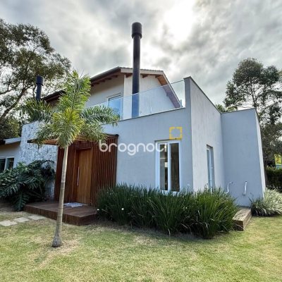 Casa de Condomínio com 197m², 4 quartos (sendo 4 suítes), 3 garagens, no bairro Campo Duna em Garopaba