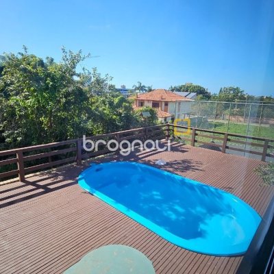 Casa com 288m², 6 quartos (sendo 2 suítes), 2 garagens, no bairro Praia Brava em Florianópolis