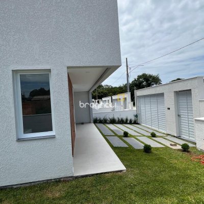 Casa com 138m², 3 quartos (sendo 1 suíte), 2 garagens, no bairro Ingleses em Florianópolis