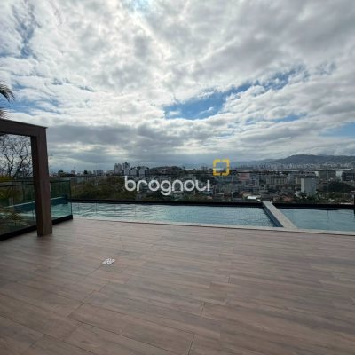 Apartamento com 59m², 2 quartos (sendo 1 suíte), 1 garagem, no bairro Coqueiros em Florianópolis