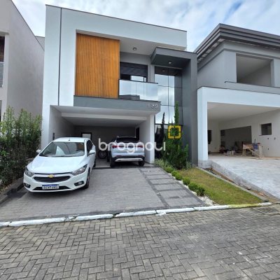 Casa de Condomínio com 184m², 3 quartos (sendo 2 suítes), 2 garagens, no bairro Beira Rio em Biguaçu