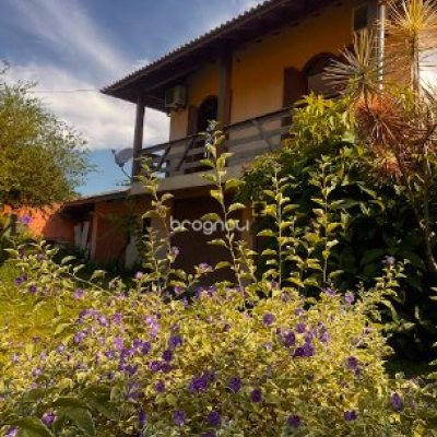 Casa com 362m², 4 quartos (sendo 4 suítes), 2 garagens, no bairro Campeche em Florianópolis