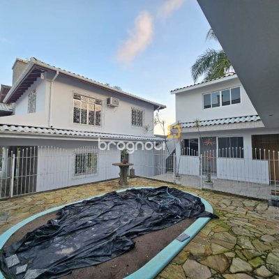 Casa com 400m², 4 quartos (sendo 2 suítes), 3 garagens, no bairro Jardim Janaína em Biguaçu