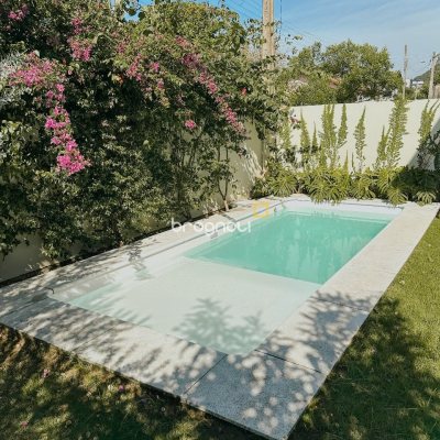 Casa com 155m², 3 quartos (sendo 1 suíte), 2 garagens, no bairro Rio Tavares em Florianópolis