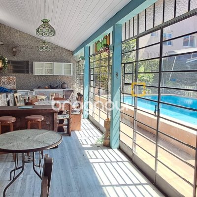 Casa com 343m², 6 quartos (sendo 2 suítes), 5 garagens, no bairro Canasvieiras em Florianópolis