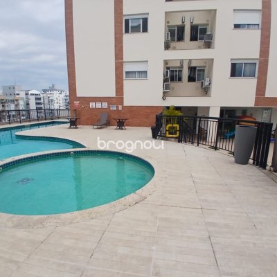 Apartamento com 67m², 2 quartos (sendo 1 suíte), 2 garagens, no bairro Coqueiros em Florianópolis