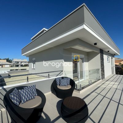 Casa de Condomínio com 261m², 4 quartos (sendo 4 suítes), 1 garagem, no bairro Cachoeira do Bom Jesus em Florianópolis