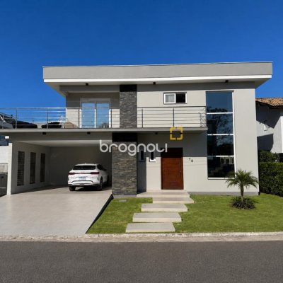 Casa de Condomínio com 261m², 4 quartos (sendo 4 suítes), 1 garagem, no bairro Cachoeira do Bom Jesus em Florianópolis