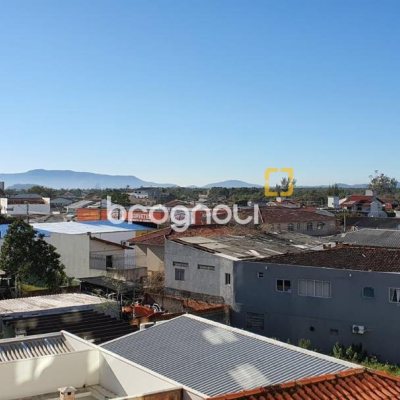 Apartamento com 61m², 2 quartos (sendo 1 suíte), 1 garagem, no bairro Centro em Palhoça