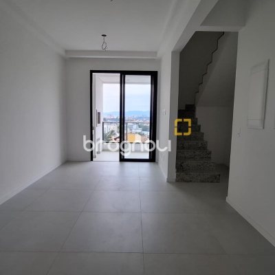 Apartamento com 123m², 3 quartos (sendo 3 suítes), 3 garagens, no bairro Coqueiros em Florianópolis