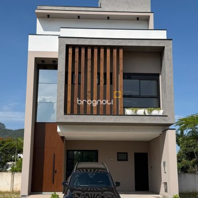 Casa de Condomínio com 200m², 4 quartos (sendo 4 suítes), 4 garagens, no bairro Beira Rio em Biguaçu