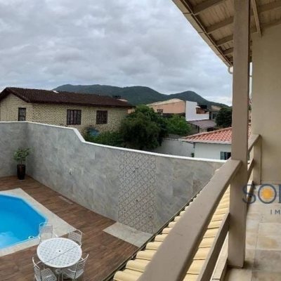 Casa Residencial com 214m², 4 quartos, 1 suíte, 4 garagens, no bairro Carianos em Florianópolis