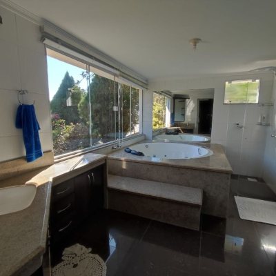 Casa em Condomínio com 287m², 6 quartos (sendo 4 suítes), 3 garagens, no bairro Bosque Das Mansões em São José