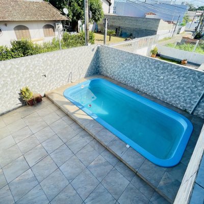 Casa Residencial com 350m², 5 quartos, 1 suíte, 4 garagens, no bairro Cachoeira Do Bom Jesus em Florianópolis