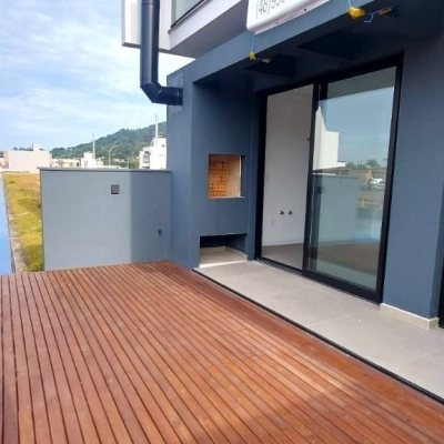 Casa em Condomínio com 216m², 3 quartos, 1 suíte, 2 garagens, no bairro Beira Rio em Biguaçu