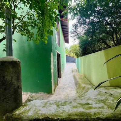 Casa Residencial com 220m², 6 quartos, 1 suíte, 3 garagens, no bairro Rio Tavares em Florianópolis