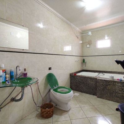 Casa Residencial com 404m², 5 quartos, 3 suítes, 5 garagens, no bairro Praia Comprida em São José