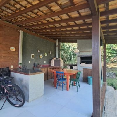 Casa em Condomínio com 297m², 5 quartos, 1 suíte, 4 garagens, no bairro Cachoeira Do Bom Jesus em Florianópolis