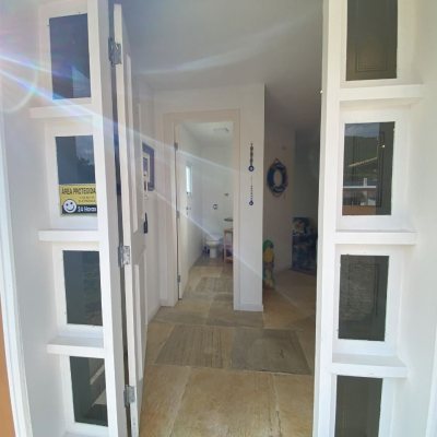 Casa Residencial com 316m², 7 quartos, 4 suítes, 2 garagens, no bairro Armação Do Pântano Do Sul em Florianópolis