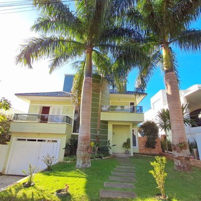 Casa em Condomínio com 277m², 3 quartos, 2 suítes, 3 garagens, no bairro Cachoeira Do Bom Jesus em Florianópolis