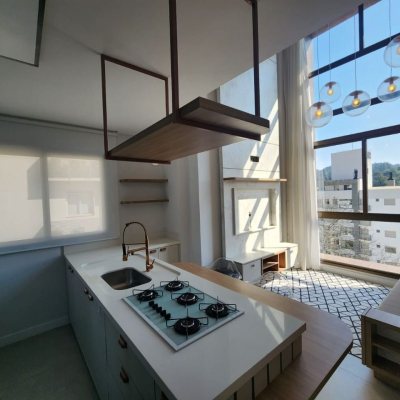 Apartamentos com 60m², 1 quarto (sendo 1 suíte), 1 garagem, no bairro Carvoeira em Florianópolis