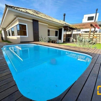 Casa em Condomínio com 197m², 4 quartos, 3 suítes, 2 garagens, no bairro Cachoeira do Bom Jesus em Florianópolis