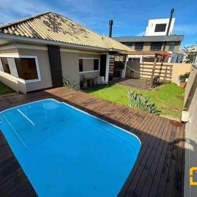 Casa em Condomínio com 197m², 4 quartos, 3 suítes, 2 garagens, no bairro Cachoeira do Bom Jesus em Florianópolis