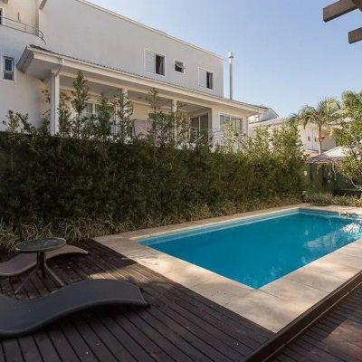 Casa em Condomínio com 329m², 3 quartos, 3 suítes, 2 garagens, no bairro Cacupé em Florianópolis