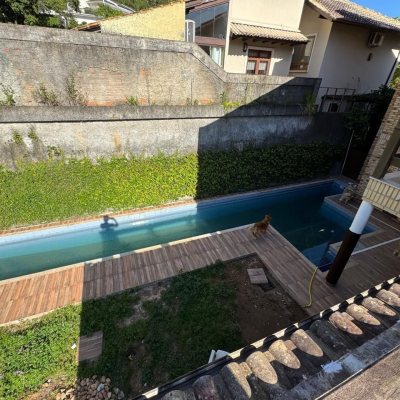 Casa em Condomínio com 361m², 5 quartos, 3 suítes, 4 garagens, no bairro Itacorubi em Florianópolis