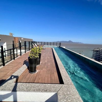 Apartamentos com 62m², 2 quartos, 1 suíte, 1 garagem, no bairro Coqueiros em Florianópolis