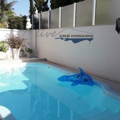 Casa Residencial com 720m², 5 quartos, 2 suítes, 2 garagens, no bairro Jurerê Internacional em Florianópolis