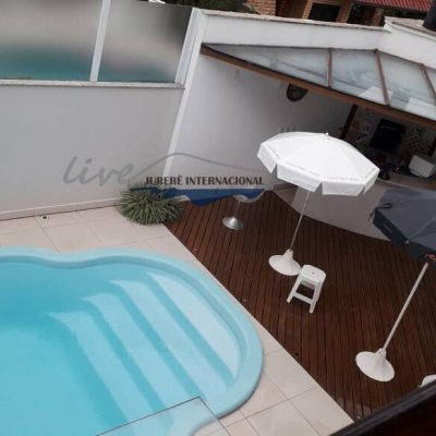 Casa Residencial com 720m², 5 quartos, 2 suítes, 2 garagens, no bairro Jurerê Internacional em Florianópolis