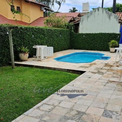 Casa Residencial com 316m², 5 quartos, 2 suítes, 2 garagens, no bairro Jurerê Internacional em Florianópolis