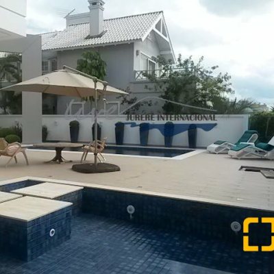 Casa Residencial com 665m², 5 quartos, 2 suítes, 2 garagens, no bairro Jurerê Internacional em Florianópolis