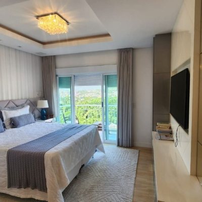 Casa Residencial com 409m², 4 quartos (sendo 4 suítes), 4 garagens, no bairro Carvoeira em Florianópolis