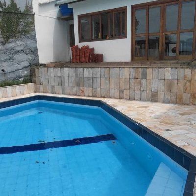 Casa Residencial com 246m², 3 quartos, 1 suíte, 2 garagens, no bairro Trindade em Florianópolis