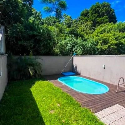 Sobrado Residencial com 100m², 3 quartos, 1 suíte, 2 garagens, no bairro Ingleses do Rio Vermelho em Florianópolis