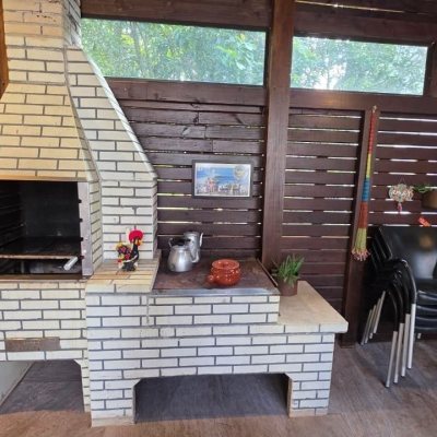 Casa Residencial com 100m², 3 quartos (sendo 1 suíte), 2 garagens, no bairro Rio Tavares em Florianópolis