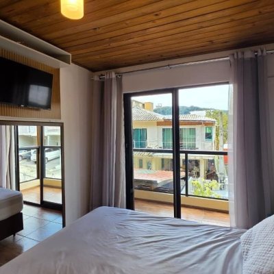 Casa Residencial com 100m², 3 quartos (sendo 1 suíte), 2 garagens, no bairro Rio Tavares em Florianópolis