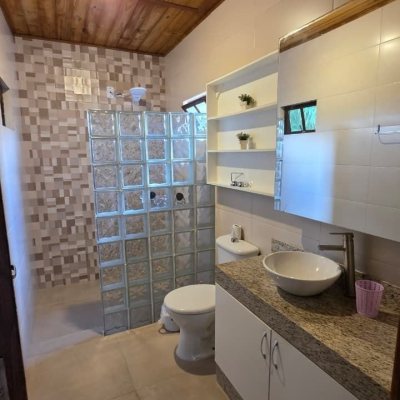 Casa Residencial com 100m², 3 quartos (sendo 1 suíte), 2 garagens, no bairro Rio Tavares em Florianópolis