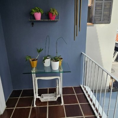 Casa Residencial com 316m², 4 quartos, 2 suítes, 2 garagens, no bairro Estreito em Florianópolis